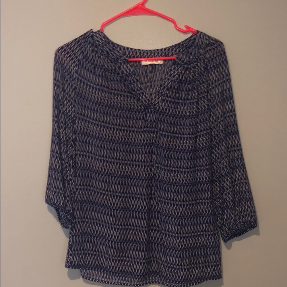 Woman’s party blue and white blouse